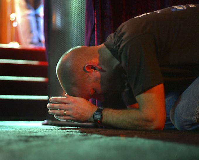 a-man-brought-to-his-knees